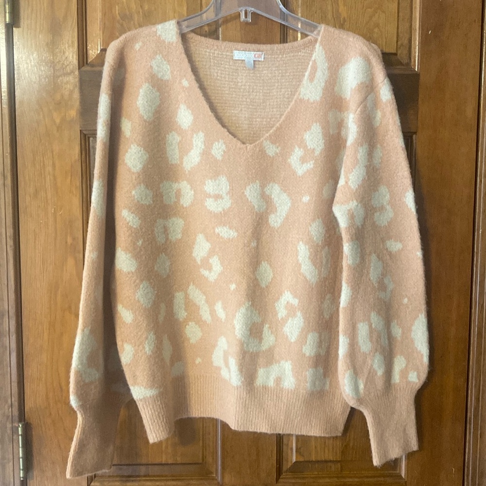 Women’s pink animal print sweater